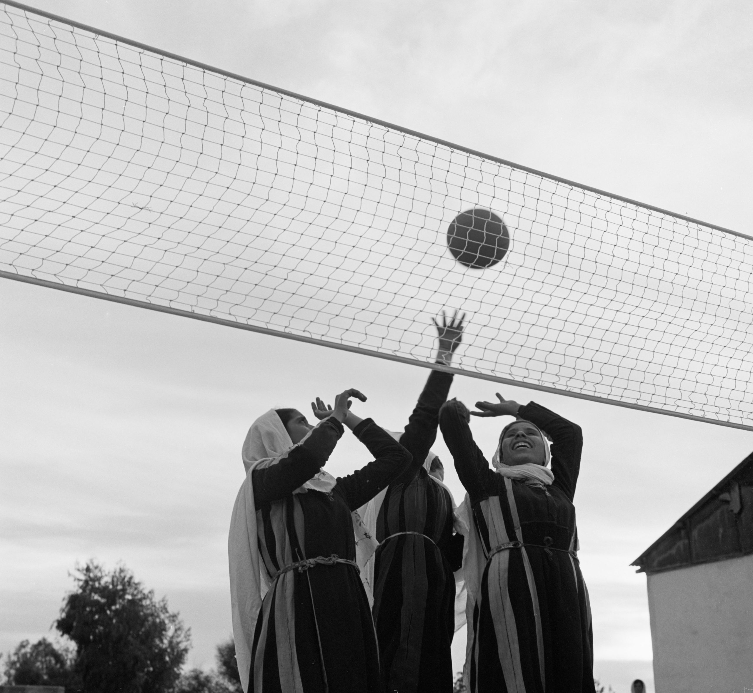 A group of Palestine refugee girls play volleyball at the Women's Program Center in Jabalia Camp, Gaza Strip. © 1969 UNRWA Archive Photographer Unknown