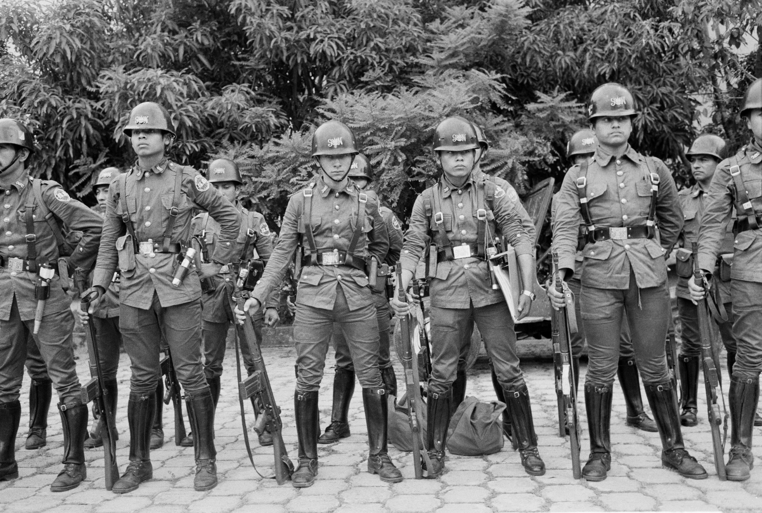 Members of the National Guard stand at attention in their central garrison in San Salvador, El Salvador, May 22, 1984. (Photo by Robert Nickelsberg/Getty Images)